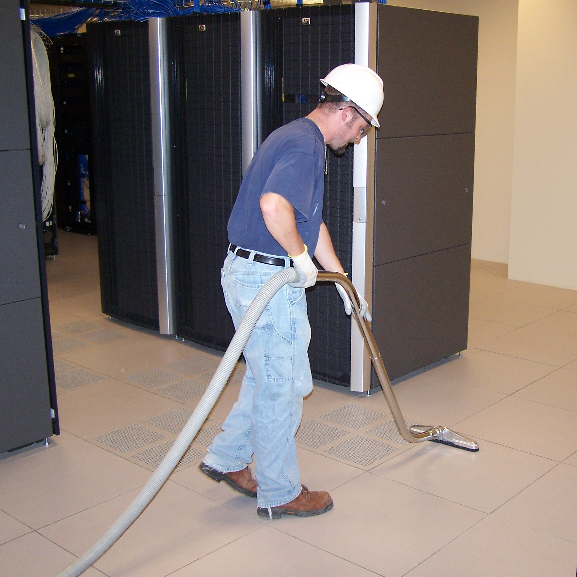 HEPA-filtered vacuuming around server racks